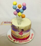Girl holding balloon- Buttercream Birthday cake